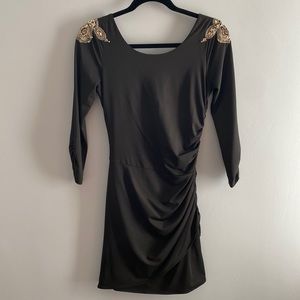 Black cocktail/party dress with beaded shoulders and open back gathered details